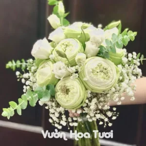 Bó hoa cưới sen xanh cầm tay cô dâu